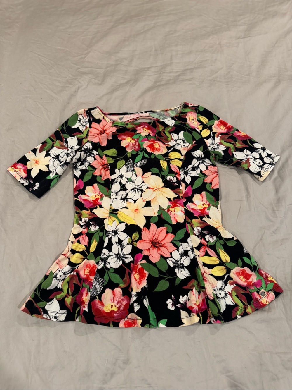 Guess Peplum Floral Top with open back.